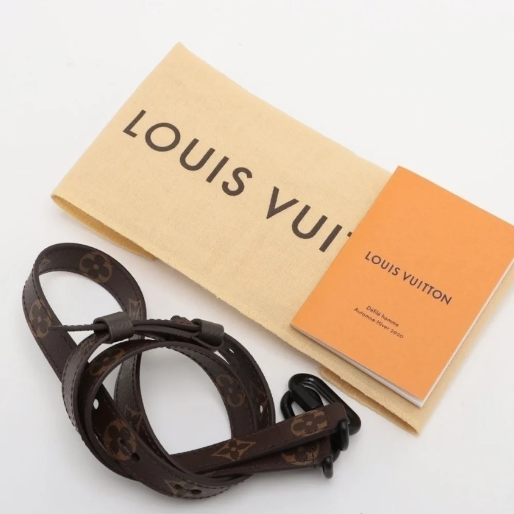 Authentic Louis Vuitton Monogram Taiga Soft Trunk Wallet - Picture 11 of 11